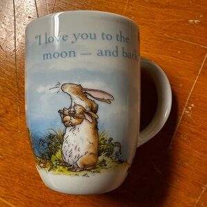 Mug made by Konitz, Germany. “ I love you to the moon and back” 4” high.